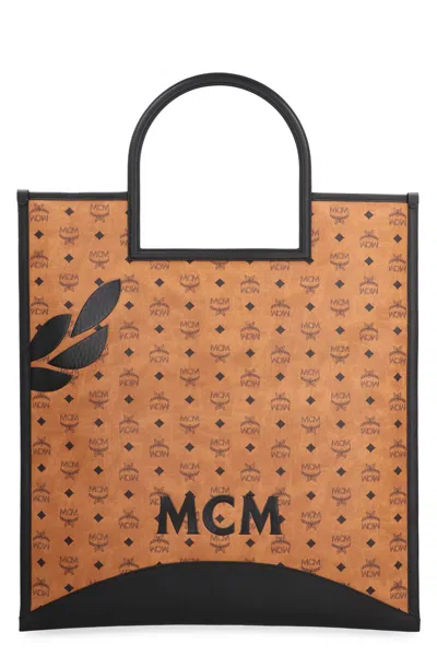 Shop Mcm X-large Aren Tote In Saddle Brown