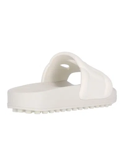 Shop Tod's Sandals In White