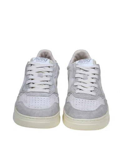 Shop Autry Suede Sneakers In Cream White
