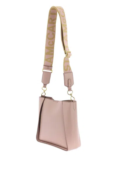 Shop Stella Mccartney Crossbody Bag With Perforated Stella Logo In Shell (pink)