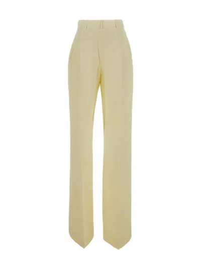 Shop Jacquemus High Waist Flare Trousers In Pale Yellow