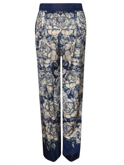 Shop Blugirl Elastic Waist Floral Print Trousers In Blue