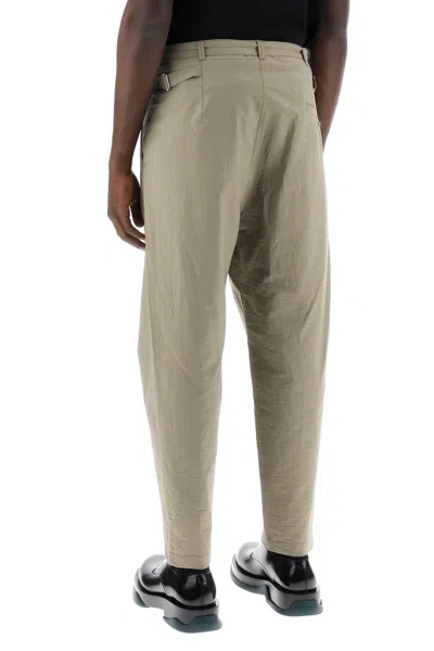 Shop Lemaire Carrot Fluid Crepe Cotton Trousers In In Khaki