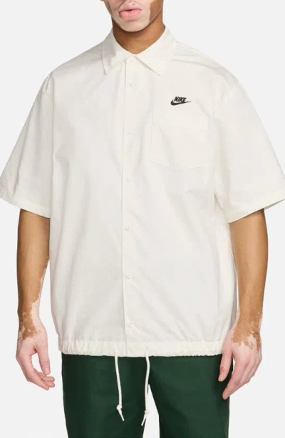 Shop Nike Club Venice Short Sleeve Drawstring Hem Cotton Button-up Shirt In Sail/ Black