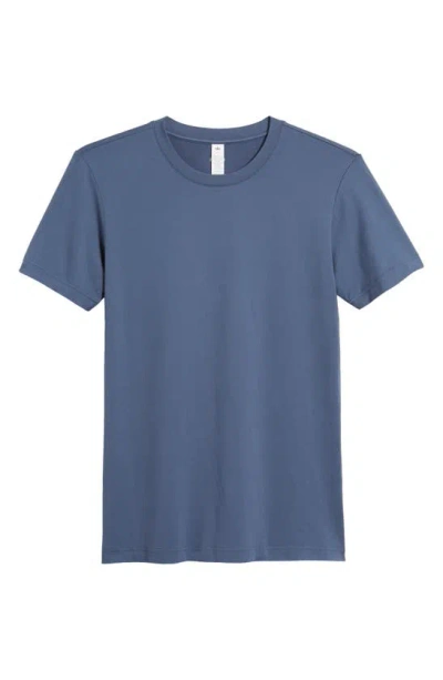 Shop Alo Yoga Conquer Reform Performance Crewneck T-shirt In Bluestone