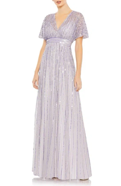 Shop Mac Duggal Sequin Empire Waist Gown In Lavender