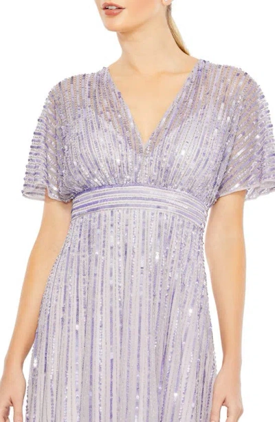 Shop Mac Duggal Sequin Empire Waist Gown In Lavender