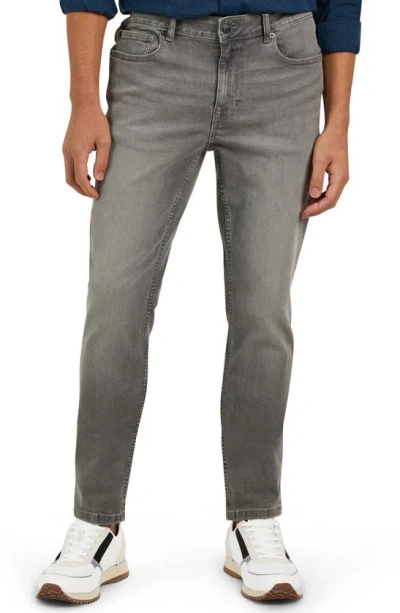 Shop Dkny Sportswear Mercer Skinny Jeans In Grey Dawn