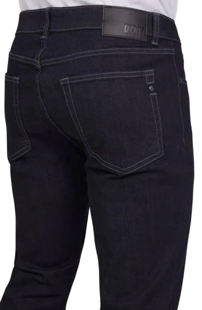 Shop Dkny Sportswear Mercer Skinny Jeans In Dark Rinse