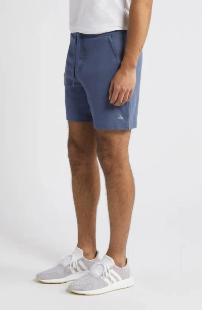 Shop Alo Yoga Chill Shorts In Bluestone
