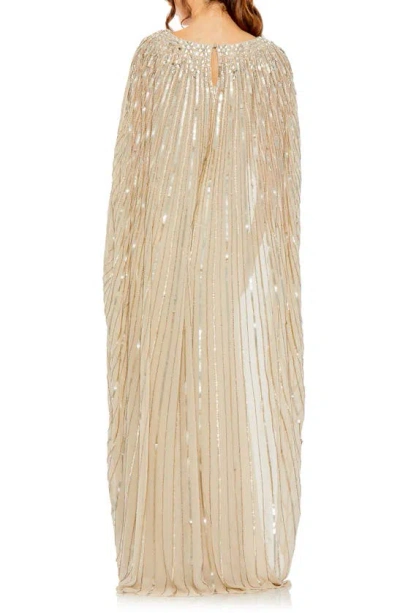 Shop Mac Duggal Sequin Embellished Long Sleeve Capelet Column Gown In Champagne