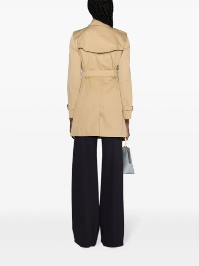 Shop Burberry Double-breasted Trench Coat In Beige