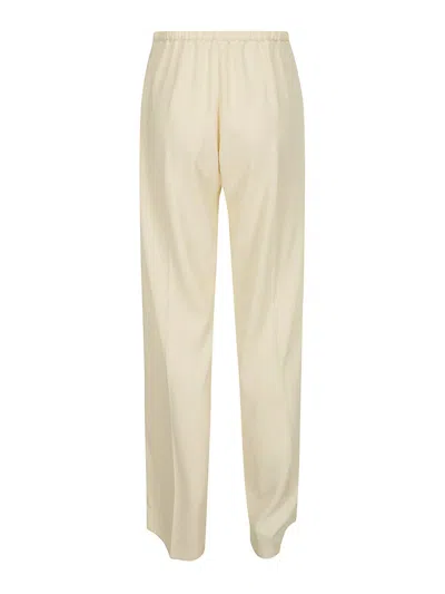 Shop Drhope Pants With Side Zip In Cream