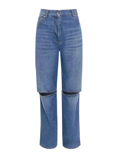 Shop Jw Anderson Cut-out Bootcut Jeans In Dark Wash