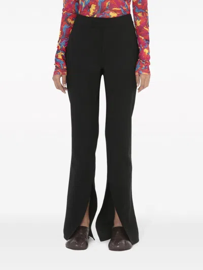 Shop Jw Anderson Front-slit Straight-leg Trousers In Black