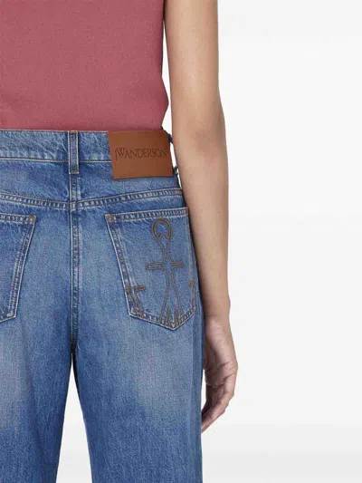 Jw Anderson Cut-out Bootcut Jeans In Dark Wash