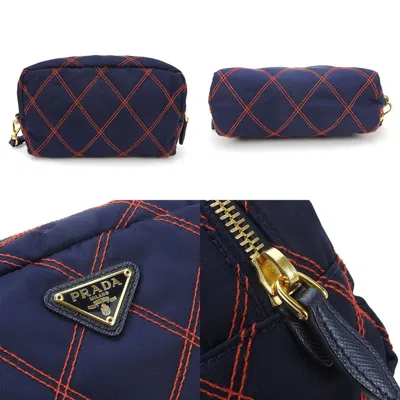 Shop Prada Navy Canvas Clutch Bag ()