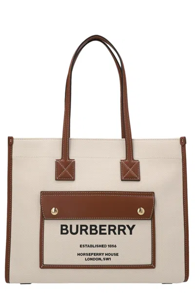 Shop Burberry Women 'freya' Small Shopping Bag In Cream