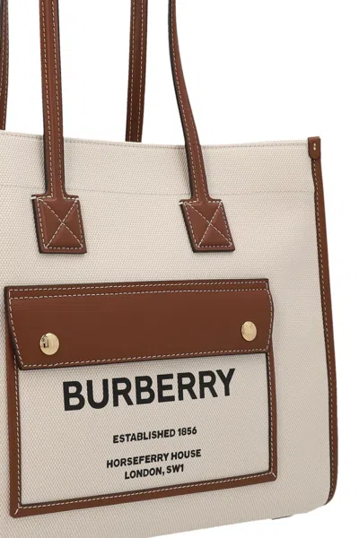 Shop Burberry Women 'freya' Small Shopping Bag In Cream