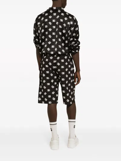 Shop Dolce & Gabbana Allover Logo Shorts In Black
