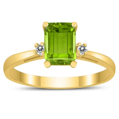 Shop Sselects Emerald Cut 7x5mm Peridot And Diamond Three Stone Ring In 10k Yellow Gold