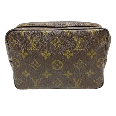 Pre-owned Louis Vuitton Trousse De Toilette Canvas Clutch Bag () In Brown