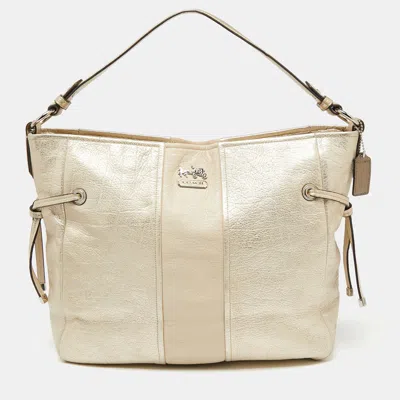 Shop Coach Light Gold Leather Side String Shoulder Bag