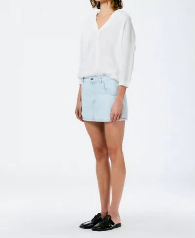 Shop Tibi Bleached Denim Mini Skirt In White