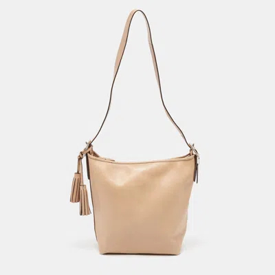 Shop Coach Beige Leather Legacy Tassel Shoulder Bag