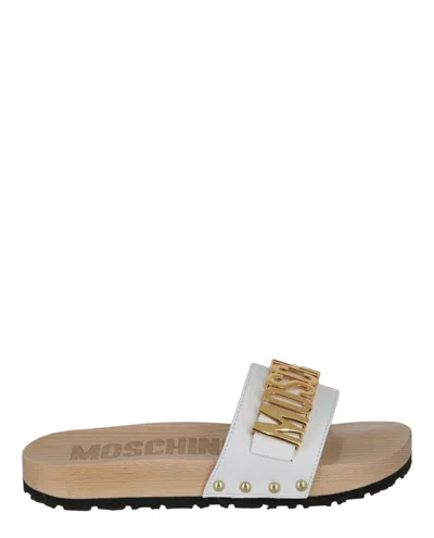 Shop Moschino Logo Lettering Slides In White