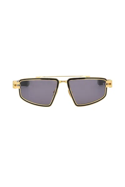 Shop Balmain Titan Sunglasses In Gold