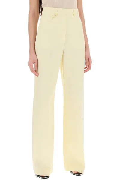 Shop Jacquemus Wide-leg Trousers In Yellow