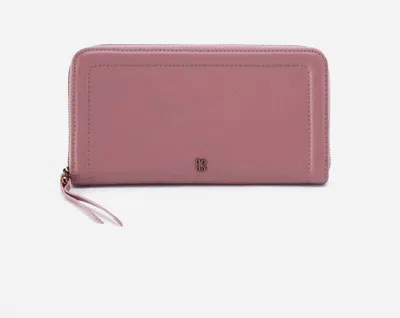 Shop Hobo Women's Nila Large Zip Around Wallet-pebbled Leather In Mauve In Multi