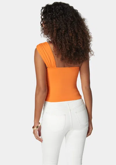 Bebe Asymetric Drapped D Ring Knit Top In Persimmon Orange