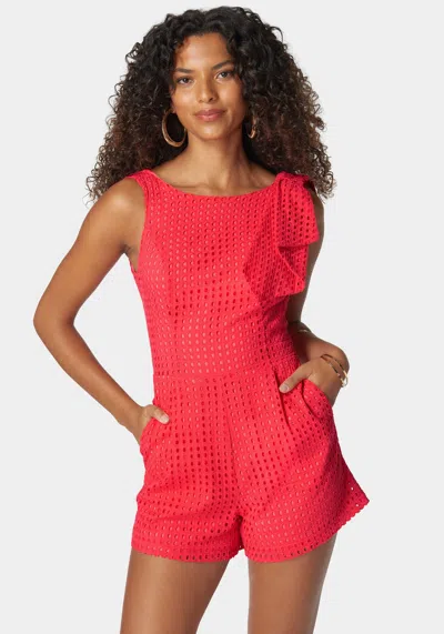 Shop Bebe Eyelet Open Back Bow Detail Romper In Hibiscus