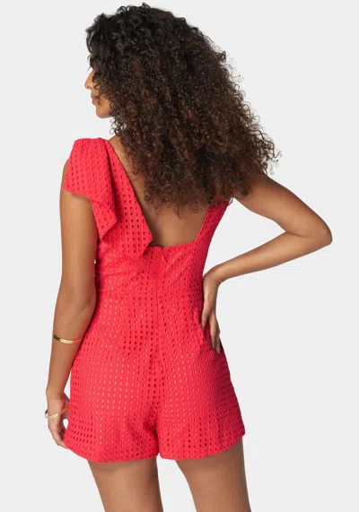 Shop Bebe Eyelet Open Back Bow Detail Romper In Hibiscus