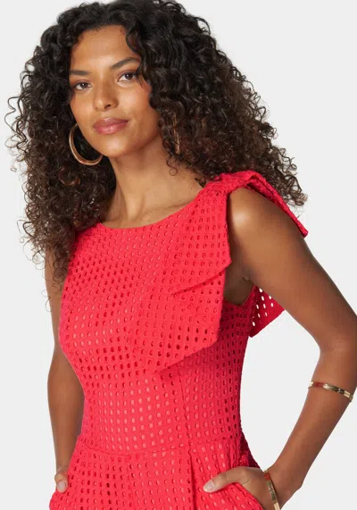 Shop Bebe Eyelet Open Back Bow Detail Romper In Hibiscus