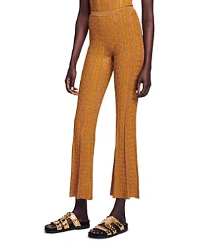 Shop Sandro Metallic Cable Knit Flared Pants In Amber