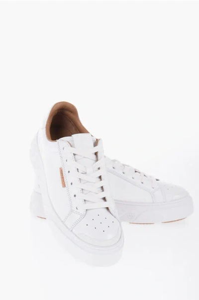 Shop Tory Burch Textured Leather Ladybug Low-top Sneakers With Logoed Sole