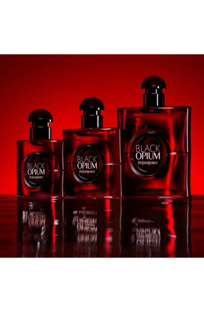 Shop Saint Laurent Black Opium Eau De Parfum Over Red, 1.6 oz