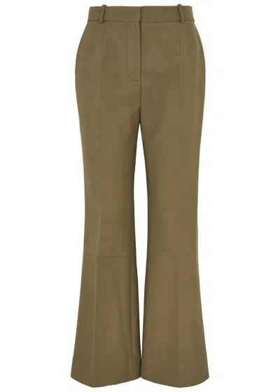 Shop Victoria Beckham Kick-flare Cotton Trousers In Green