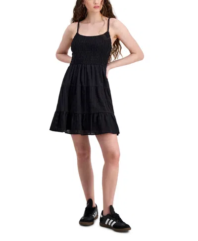 Shop Hippie Rose Juniors' Smocked Tiered Mini Dress In Black