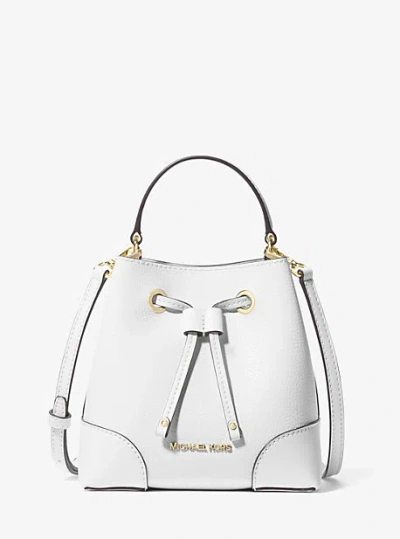Shop Michael Kors Mercer Small Pebbled Leather Bucket Bag In White