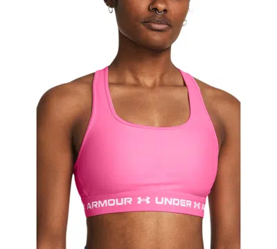 Shop Under Armour Women's Heatgear Medium Impact Sports Bra In Rebel Pink,white