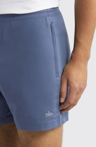 Shop Alo Yoga Conquer React Training Shorts In Bluestone
