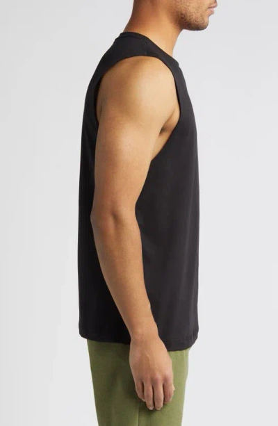 Shop Alo Yoga Conquer Muscle Tank In Black