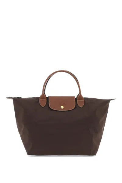 Shop Longchamp Le Pliage Medium Shopping Bag In 棕色的