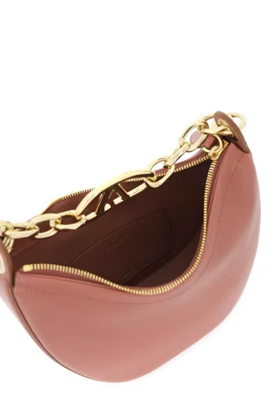 Shop Valentino Garavani Mini Vlogo Moon Bag In Nappa Leather With Chain In 中性，粉红色