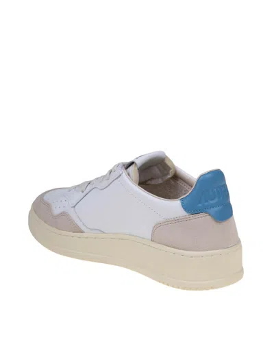 Shop Autry Leather And Suede Sneakers In White/blue