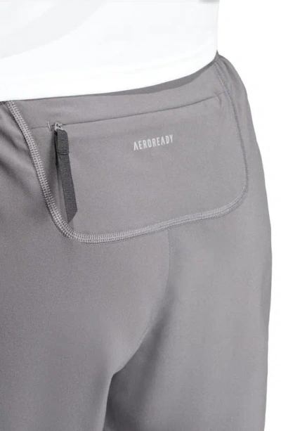 Shop Adidas Originals Adidas Own The Run Recycled Polyester Running Shorts In Grey Six